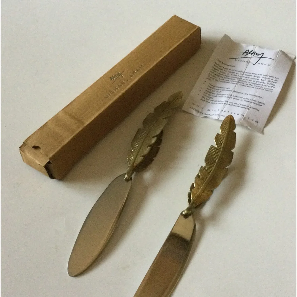 MICHAEL ARAM SET OF 2 FEATHER HANDLED CHEESE KNIVES NWT